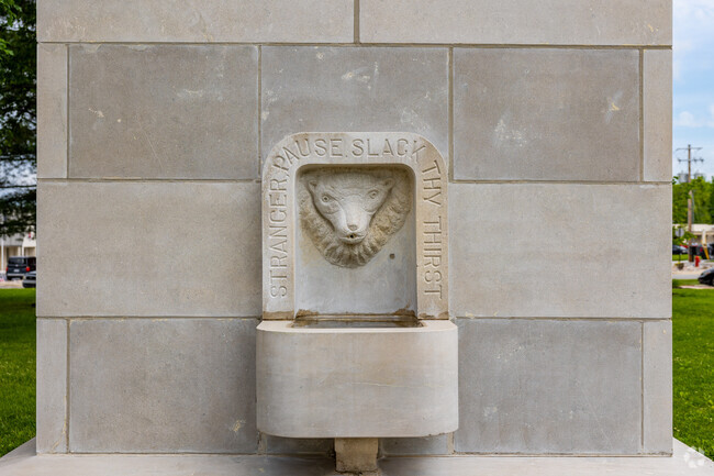 A fountain memorial in front of the Ozark Courthouse has historical significance.