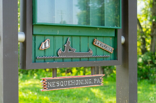 A neighborhood sign highlights water fun around Nesquehoning.