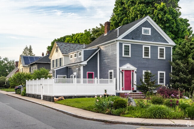 This historic Colonial sits on a quiet street just outside the downtown Dedham area.