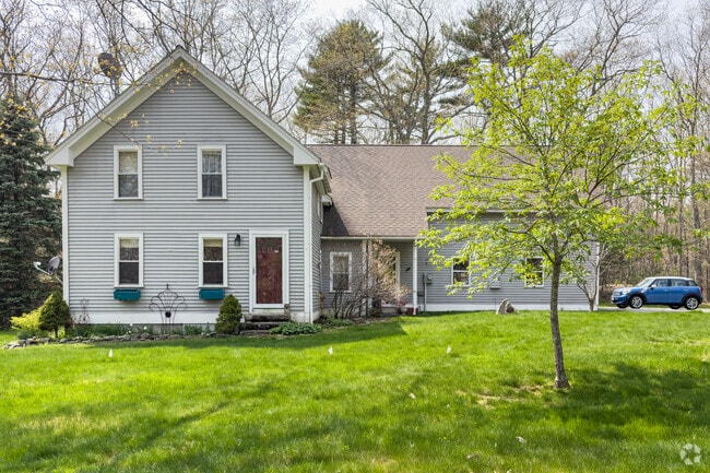 Early 20th-century homes with cathedral ceilings are common in Arrowsic’s wooded landscape.