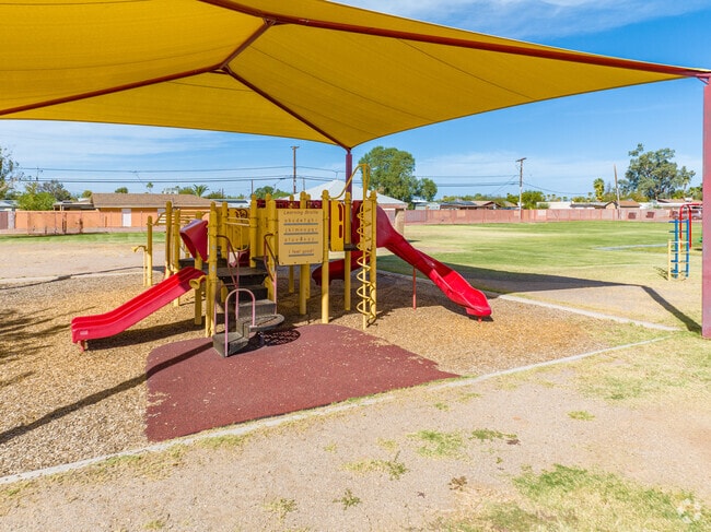 Younger students at the Center for Online and Innovative Learning can play on the playground.