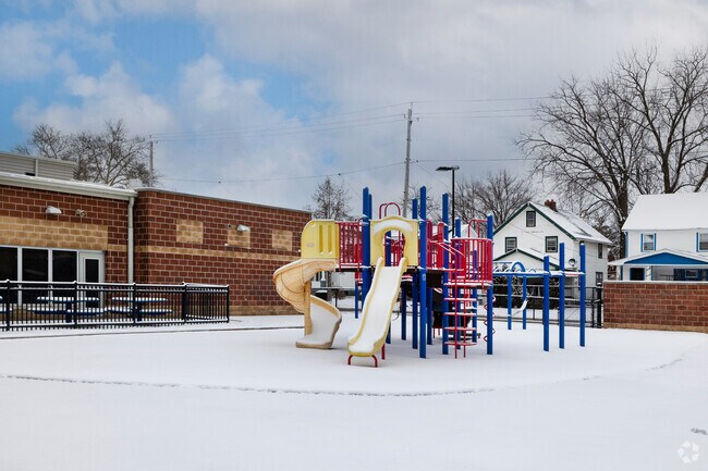 Robert H Jamison School outdoor playground beckons with colorful equipment.