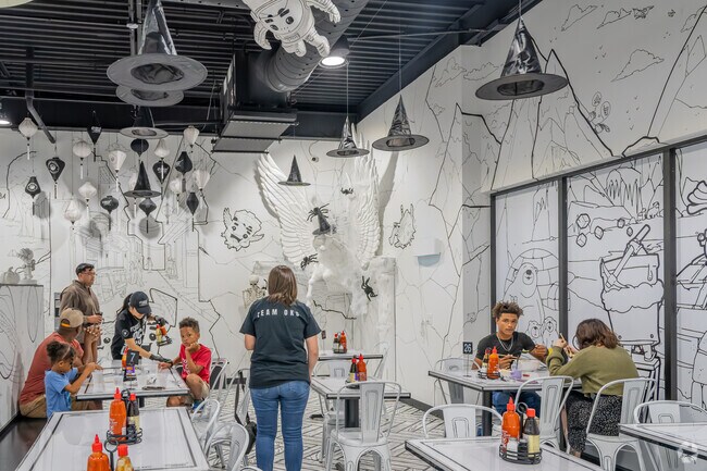 Twenty Pho Hour near Camelot Bel-Aire, is a fast-casual noodle bar with a 2-D art vibe.