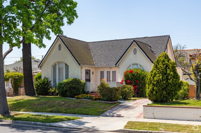 Plant a colorful garden in front of your Tudor style home in Ethel Park.