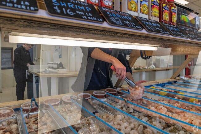 Buy fresh seafood by the pound at Captain's Catch in Geneva.