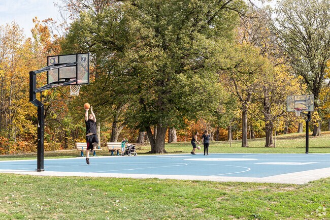 The well taken care of basketball courts in Garfield Park are a great place play a game.