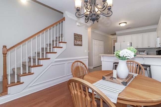 Dining, laundry is behind the pocket doors