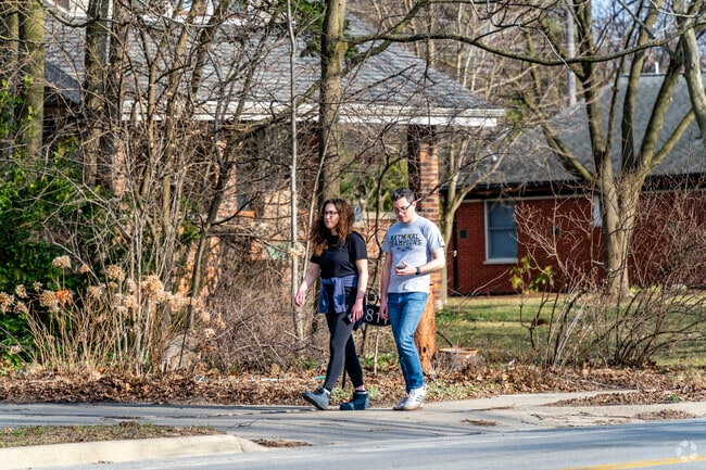 Locals from the South Packard neighborhood enjoy a walk on a nice warm day.