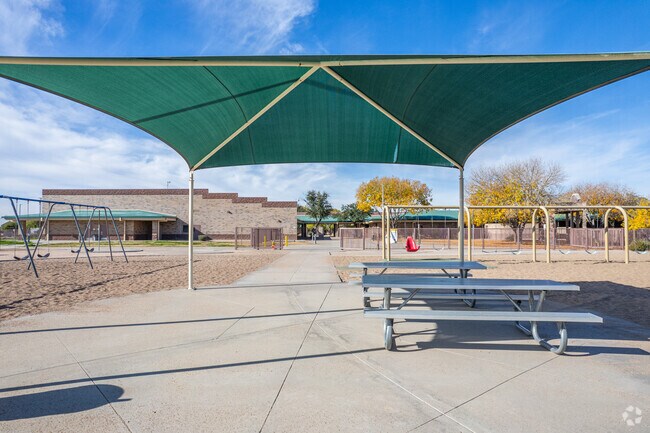 Covered tables for eating at Greenbrier Elementary School in Glendale.