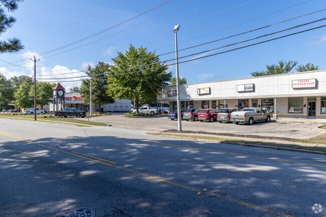 Savage-Glover has a salon, restaurant, barber, and Family dollar in the middle of it.