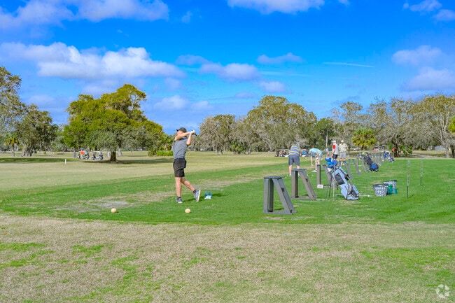 Perfect your golf swing at Spruce Creek Country Club in Samsula-Spruce Creek.