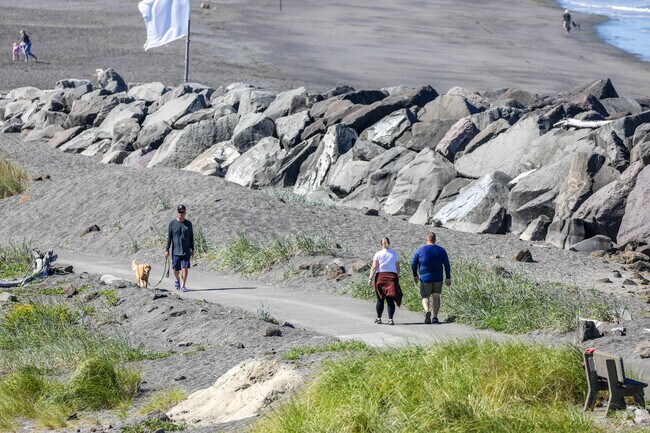 Bay City residents head to the shoreline for daily exercise.