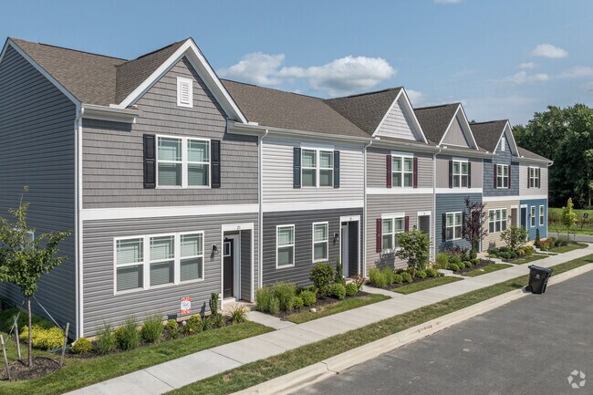 Loganberry Village is a new development in Woodside East with SFH and Townhomes, built ~2020's.