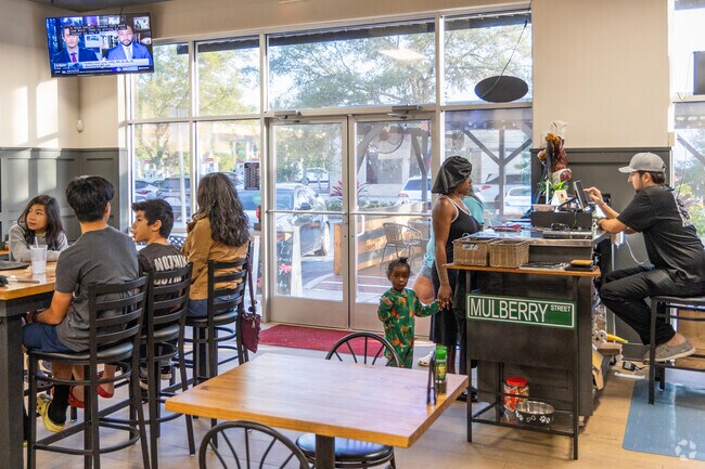 Johnny C's has delicious food near Cory Lake Isles.