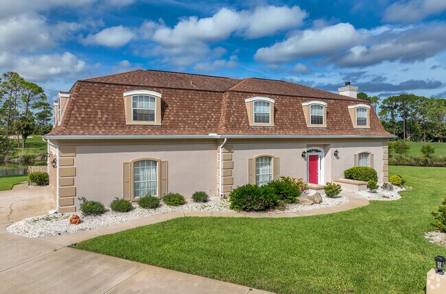 This 2 story crafstman style house is one of the more eclectic offerings in Plantation Bay.