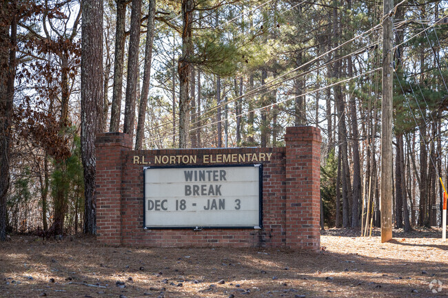 The original school sign still sits in front of Norton Elementary School.