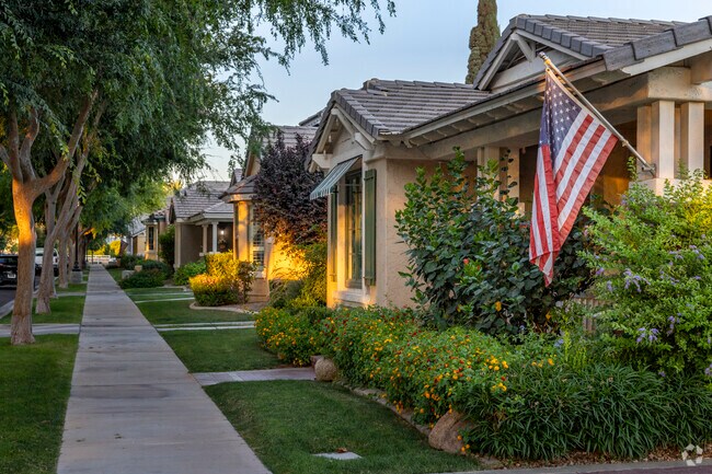 Take a walk through Agritopia and enjoy the manicured lawns.