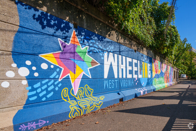 Take a look at this colorful mural as you travel along the Heritage Trail near Center Wheeling.