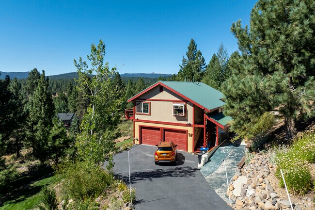 Olympic Heights has many lots with steep driveways with the variable foundations in the area.