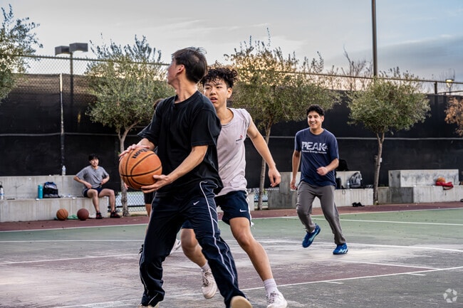 Youth enjoying a game of basketball at the Rowland Heights Community Center in Rowland Heights.
