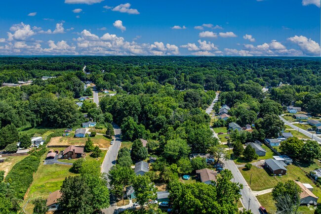Martin Area residents enjoy quiet surroundings with mature trees.