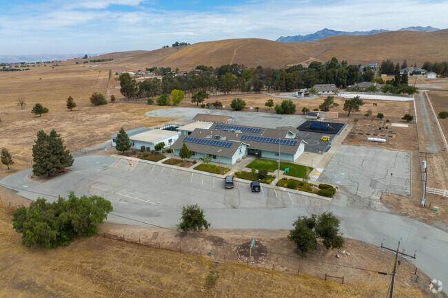 Campus and landscape of Tres Ninos Union School in San Benito County.