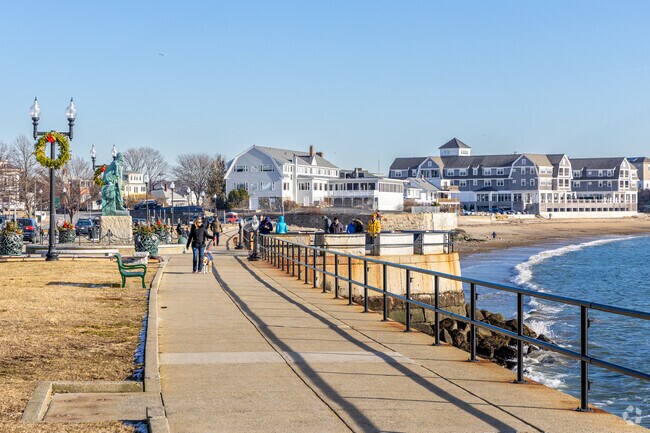 Residents enjoy a walk along the waterfront year round in Central Gloucester, MA.