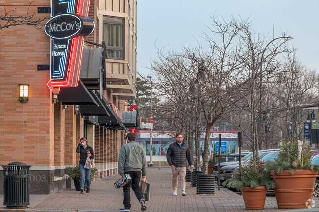 People running errands at the Excelsior and Grand shopping district.