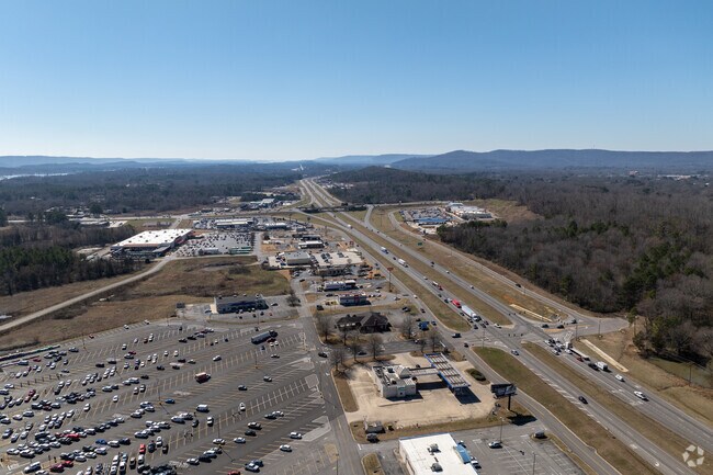 Highway 72 runs through Scottsboro and directly connects with Huntsville Alabama and Chattanooga Tennessee.