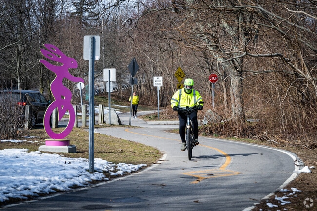 Pedal through picturesque landscapes on East Bay Bike Path, Riverside, East Providence.