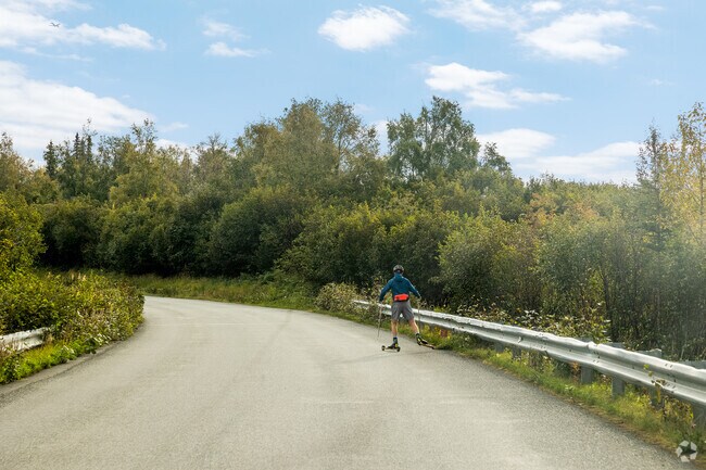 A ski enthusiast preps for cross country skiing in Basher.