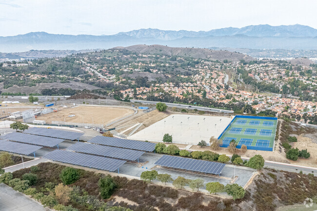 Solar panels with panoramic views of the surrounding mountains at Diamond Ranch High School