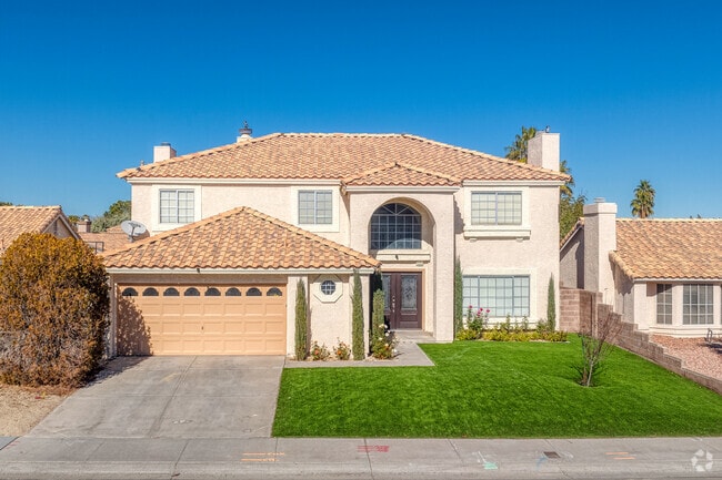 Whitney Ranch Two Story Spanish Style Home with tuff built in the 1990's.