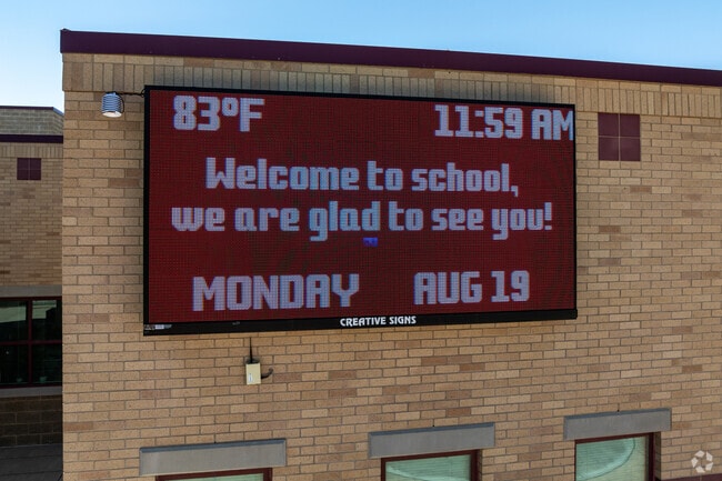 An electronic sign welcomes students back to school at Heartland Elementary School.