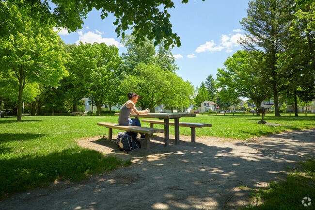 A young woman enjoys some quiet time at Edgerton Park in nearby Edgerton.