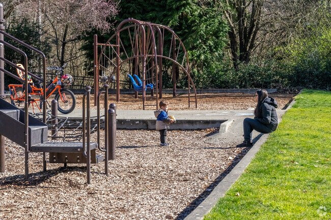 Picnic Point Park offers playgrounds and green space near Lake Stickney.