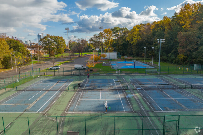 Challenge your friends to a match of tennis at Scalzi Park.