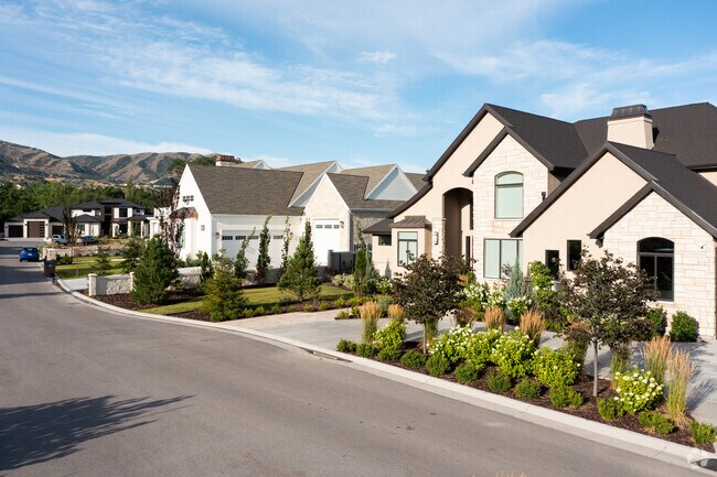 Front-gabled roofs and stone and brick exteriors are common in Draper.