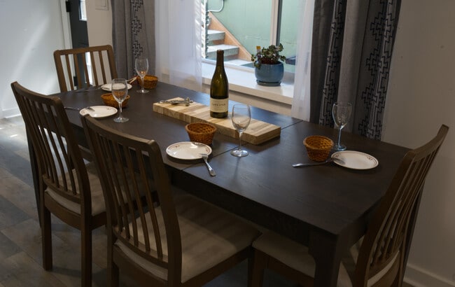 Dining table can be reduced to seat four or opened to seat six. Each parlor has private dining if de