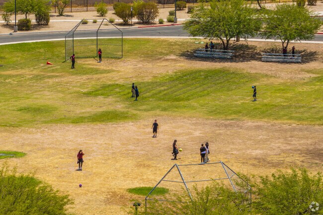 Percy L Julian School kids play in the open field areas.