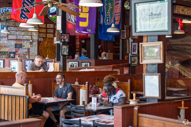 Grab a bite with friends at Dreamland BBQ in Five Points South.
