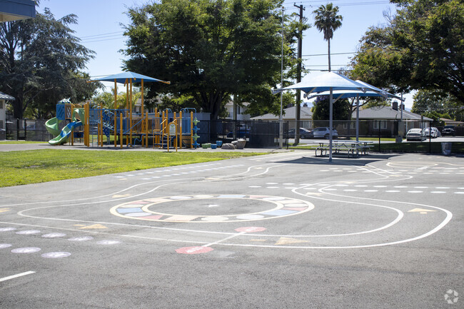 The playground at Scott Lane Elementary School entertains Downtown Santa Clara students.