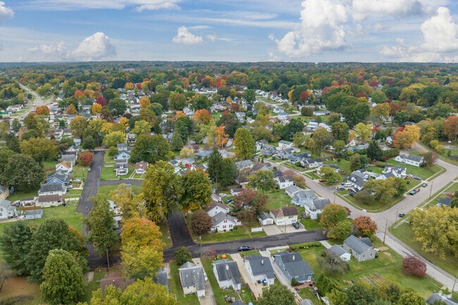 Aerial view of Johnsons Corners neighborhood with many types and styles of homes.