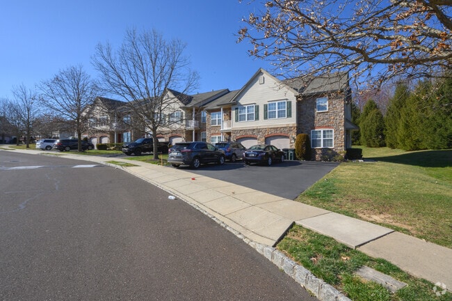 Stone front townhomes have a newer design with multiple units in Somerton, Pennsylvania.