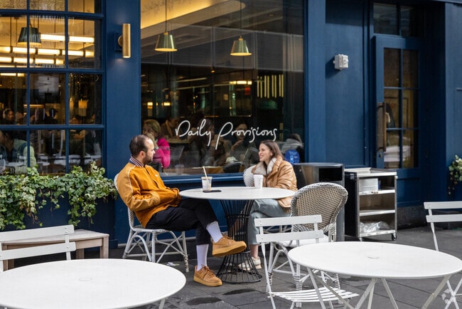 People grab a coffee at Manhattan West.