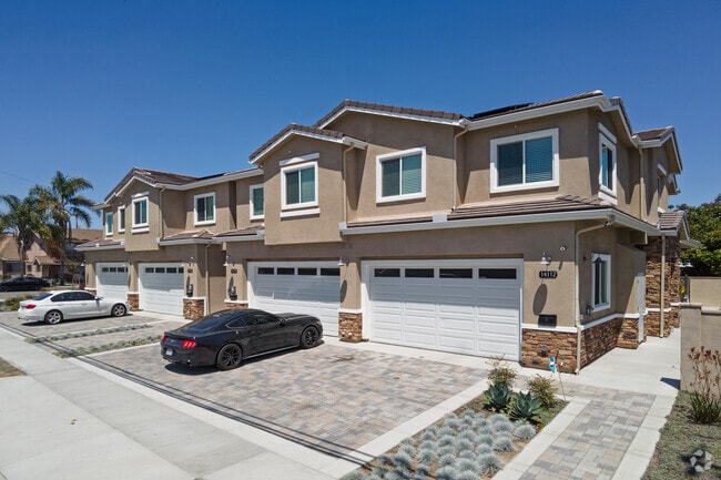 Newer developments with shared walls come with two-car garages and stone driveways.