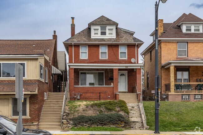 Brick single family homes are popular throughout Brookline.