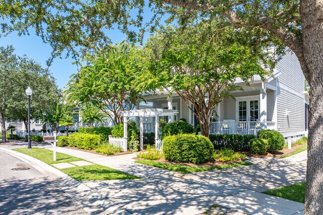 Homes in Eastwind-Piney Acres are nestled under shaded trees.