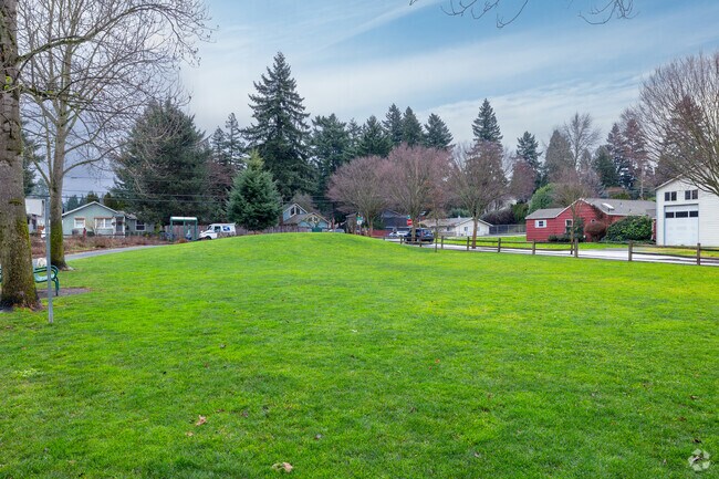 Enjoy open grass space at Ball-Michel Park on SE Willow St in Portland.