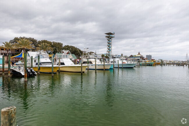 Recreation and charter boats are docked throughout the harbor at Harborwalk Village in Destin.